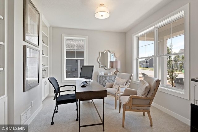 view of carpeted office space