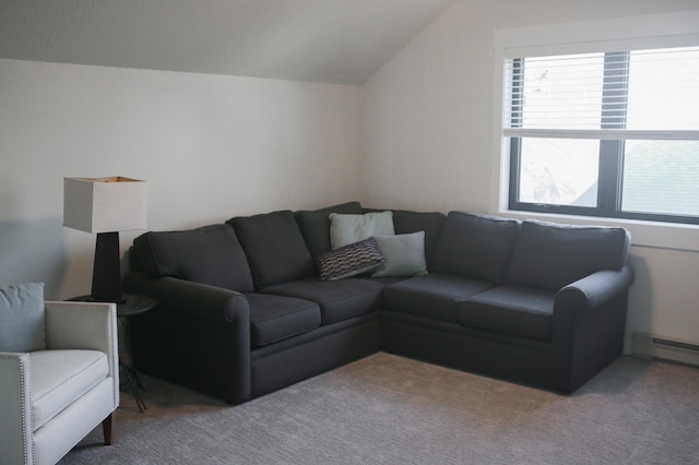 carpeted living room featuring lofted ceiling