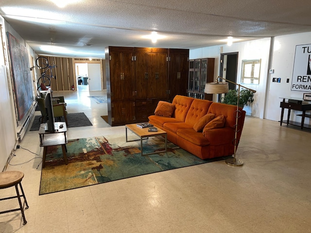 living room featuring a textured ceiling