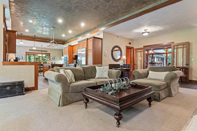 living room featuring baseboards, visible vents, recessed lighting, and light colored carpet