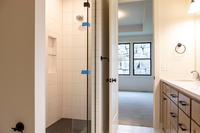 bathroom featuring vanity and walk in shower