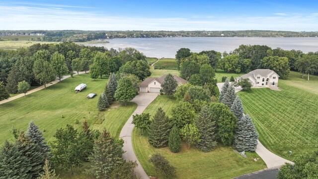 aerial view with a rural view and a water view