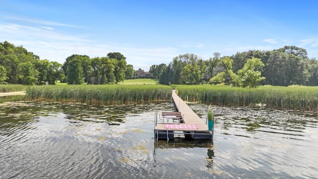 view of dock with a water view