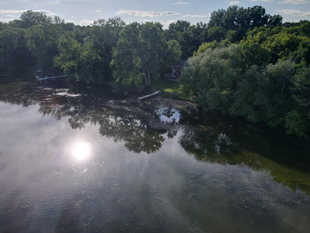 view of water feature with a wooded view