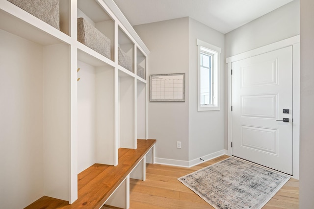 mudroom with light hardwood / wood-style floors