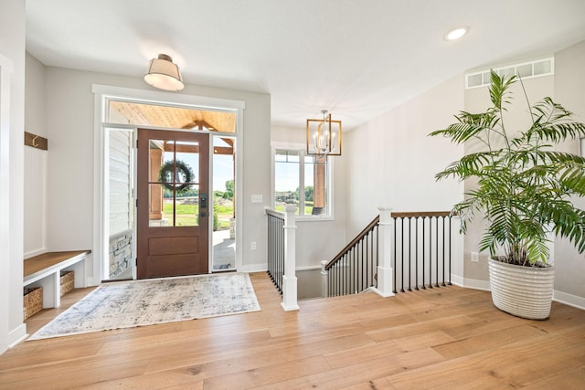 entrance foyer with light hardwood / wood-style flooring