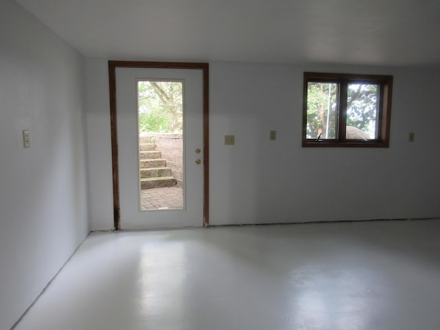 entryway featuring concrete floors