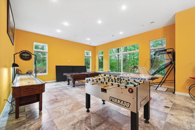 game room with pool table and light tile patterned flooring