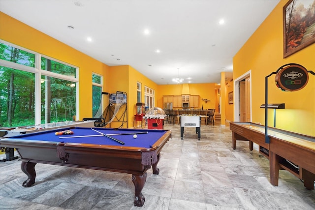 recreation room with pool table and light tile patterned floors