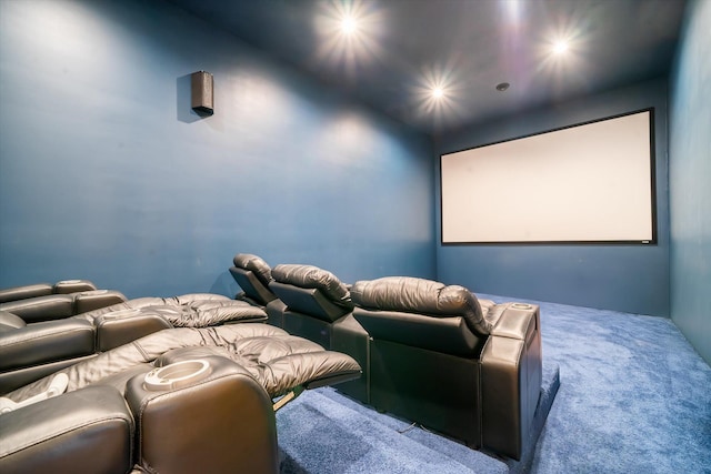 cinema room featuring carpet floors