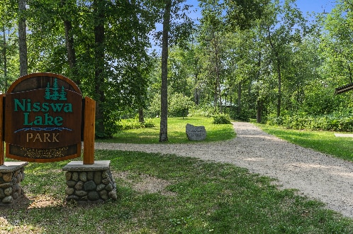 view of community with a lawn