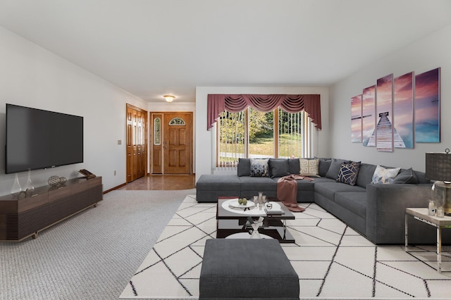 living room featuring light colored carpet