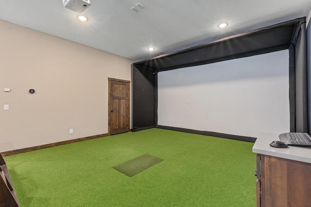 game room with golf simulator and carpet flooring