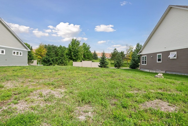 view of yard featuring fence