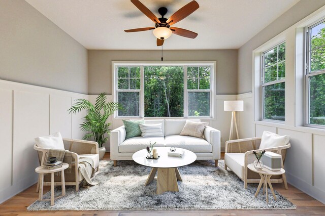 sunroom / solarium with ceiling fan