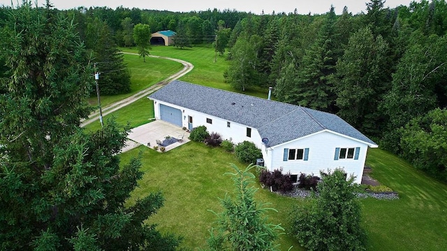 bird's eye view with a forest view