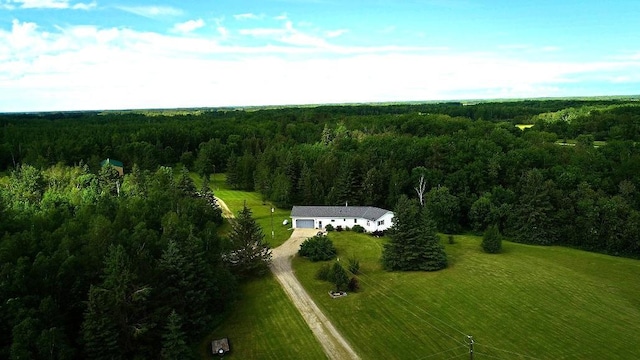 bird's eye view featuring a view of trees