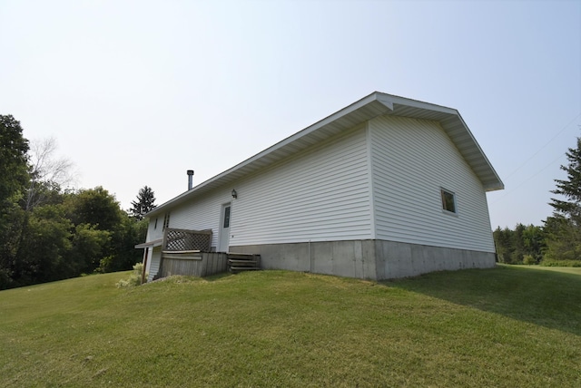 view of property exterior featuring a yard