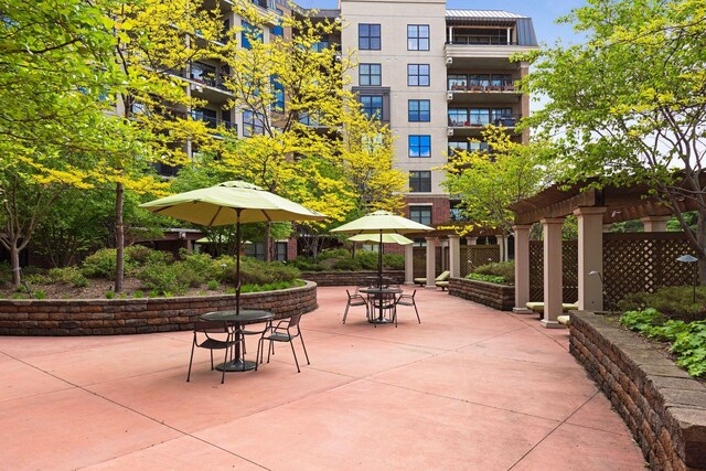 view of property's community with a patio