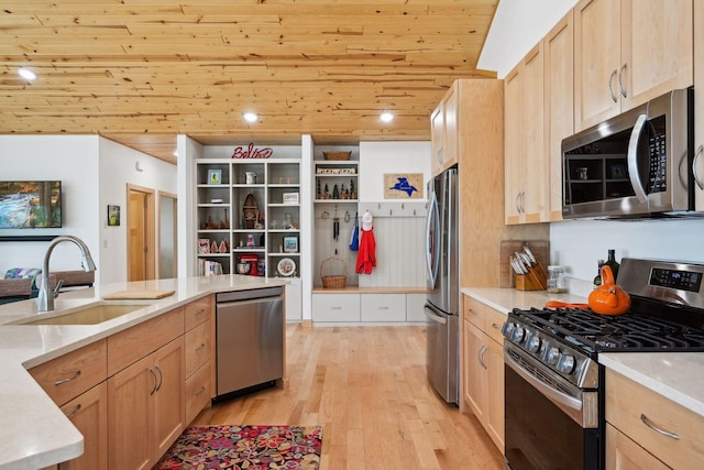 kitchen featuring wood ceiling, stainless steel appliances, light brown cabinetry, light hardwood / wood-style flooring, and sink