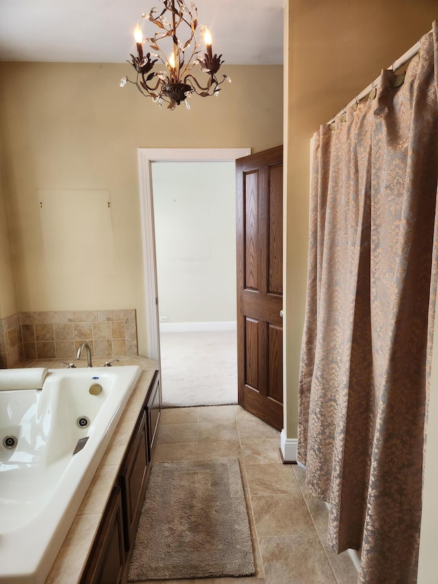 full bath with a tub with jets and tile patterned floors