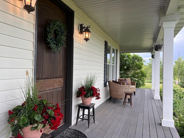 deck featuring covered porch