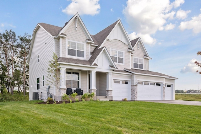 craftsman-style house featuring a front lawn, a garage, a porch, and central air condition unit