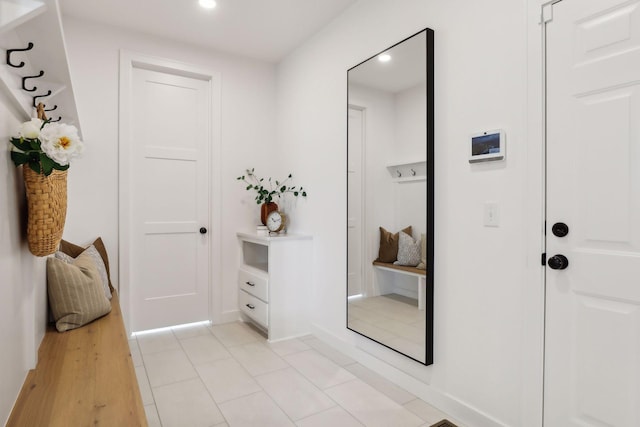 interior space with light tile patterned floors