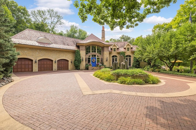 view of front of property featuring a garage