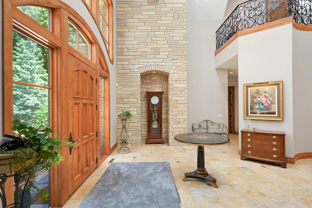 entryway with a towering ceiling