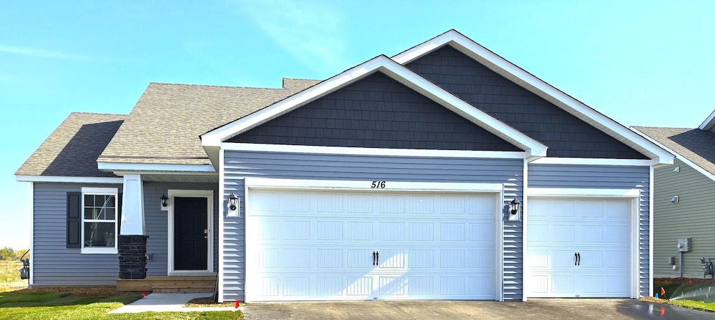 craftsman-style home featuring a garage