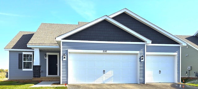 craftsman-style home featuring a garage