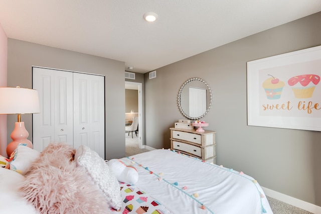 carpeted bedroom featuring a closet