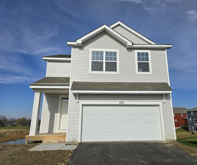 view of front of property featuring a garage