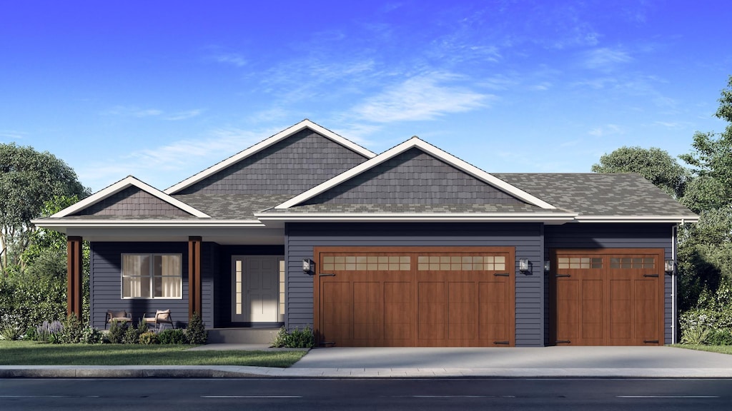 craftsman inspired home with a garage