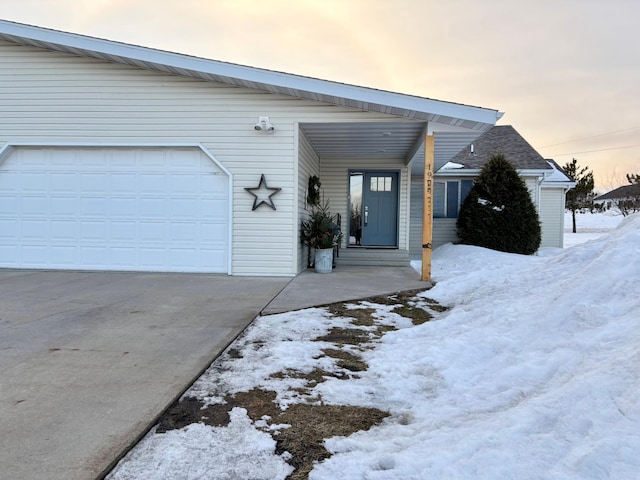 view of front of property with concrete driveway