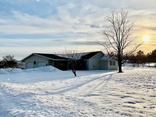 single story home featuring a garage