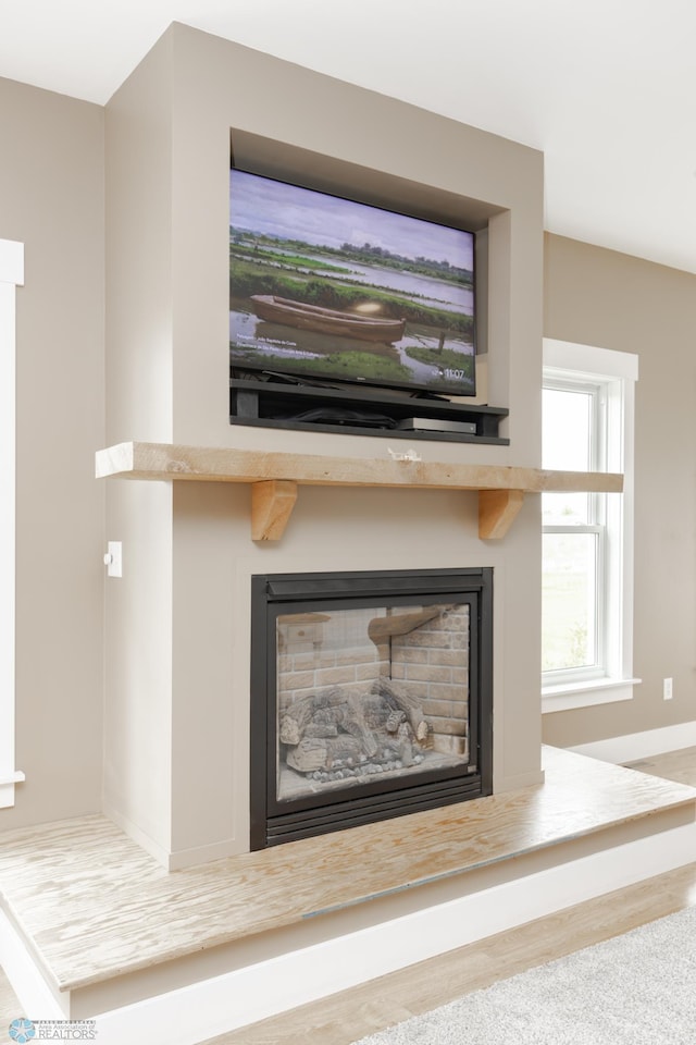 16305 57th St SE, Kindred, ND 58051 - detailed view of a fireplace and baseboards