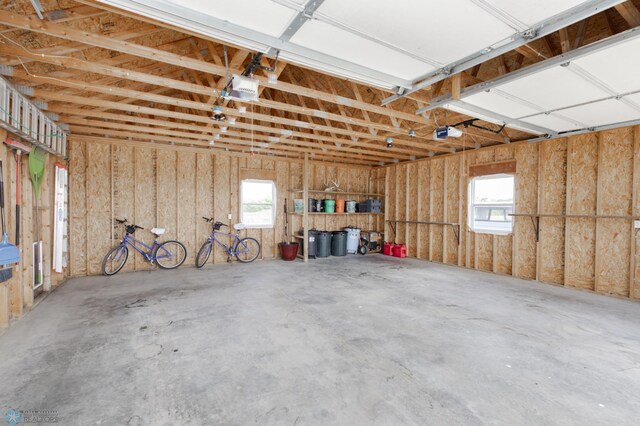16305 57th St SE, Kindred, ND 58051 - garage featuring a garage door opener