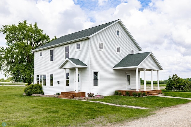 16305 57th St SE, Kindred, ND 58051 - view of front of property featuring a front yard and a shingled roof