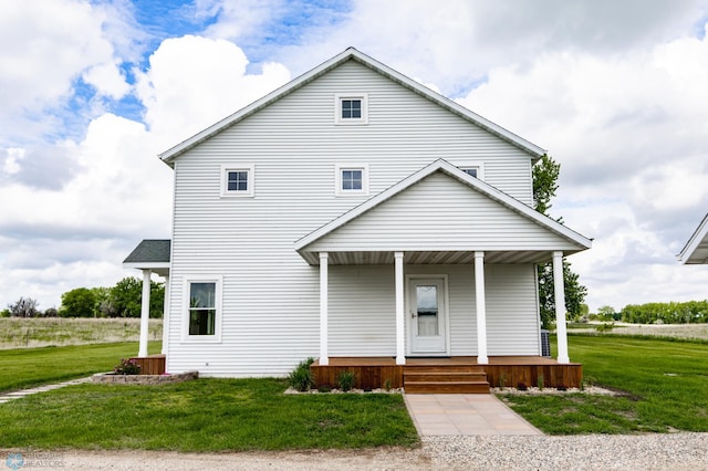 16305 57th St SE, Kindred, ND 58051 - view of front of house with a porch and a front yard