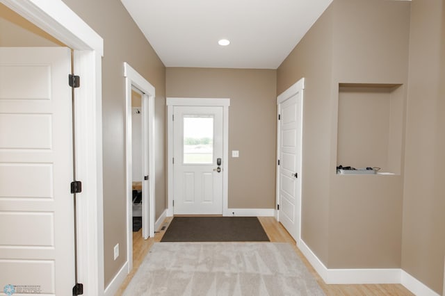 16305 57th St SE, Kindred, ND 58051 - entryway featuring wood finished floors, baseboards, and recessed lighting