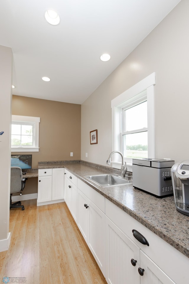16305 57th St SE, Kindred, ND 58051 - kitchen featuring a sink, light wood-type flooring, white cabinets, an office area, and recessed lighting