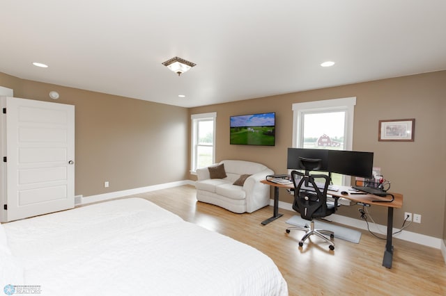16305 57th St SE, Kindred, ND 58051 - bedroom featuring light wood-style flooring, baseboards, a desk, and recessed lighting