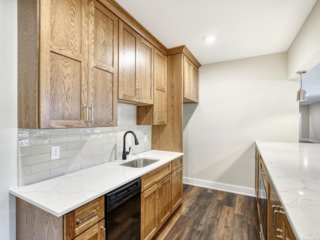 kitchen featuring a sink, light stone counters, dishwasher, dark wood-style flooring, and decorative backsplash