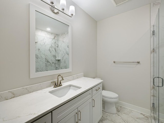 full bathroom with baseboards, marble finish floor, toilet, vanity, and a marble finish shower
