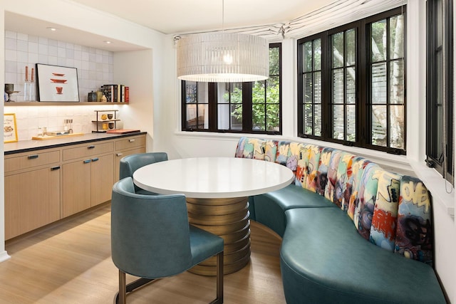 dining room with light wood-type flooring