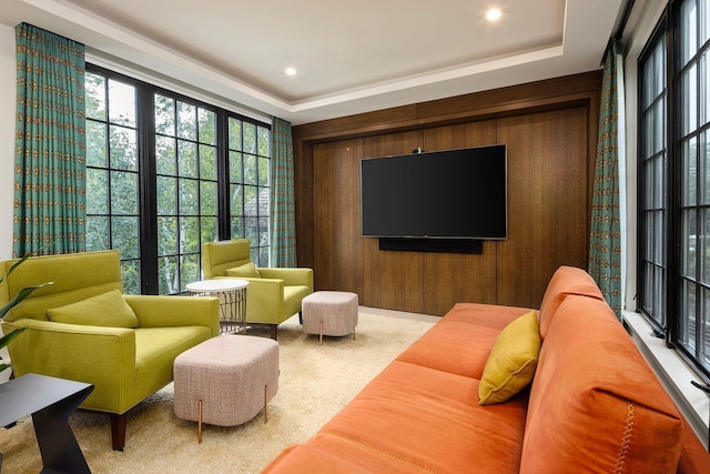 living room featuring a tray ceiling