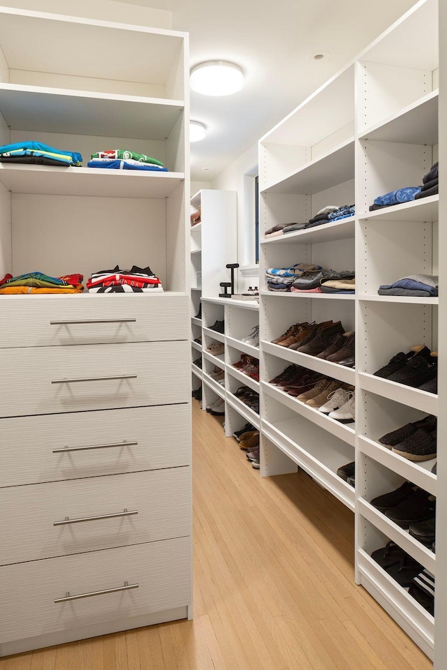 walk in closet featuring light wood-type flooring