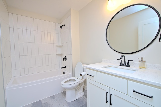 bathroom with shower / washtub combination, vanity, and toilet